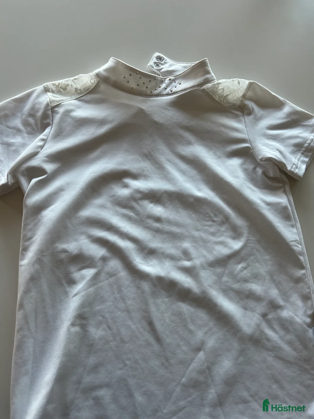 Övrigt Ridkläder ryttarutrustning till salu: Fin Tävlingstopp från CRW i stl. 134/140 i Jät - Annons 1