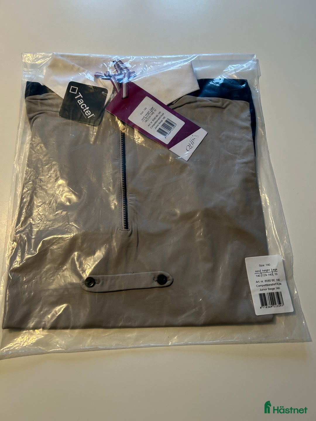 Övrigt Ridkläder ryttarutrustning till salu: QHP competitionshirt Kyle storlek 140,164,176 i Vellinge - Annons 1