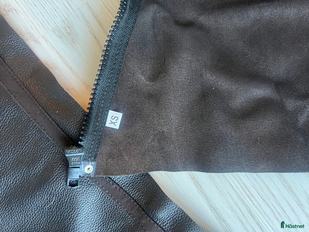 Övrigt Ridkläder ryttarutrustning till salu: Oanvända Long Chaps i brunt läder  i Solna - Annons 2