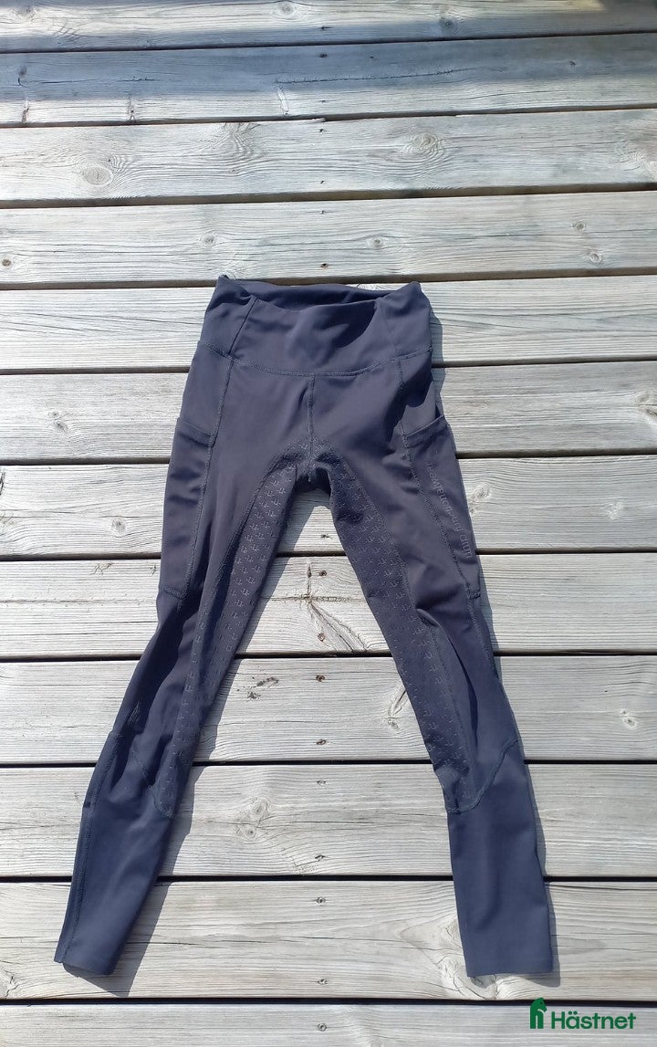 Ridbyxor ryttarutrustning till salu: Fina Uhip ridtights I mörk blå i Tanumshede - Annons 21