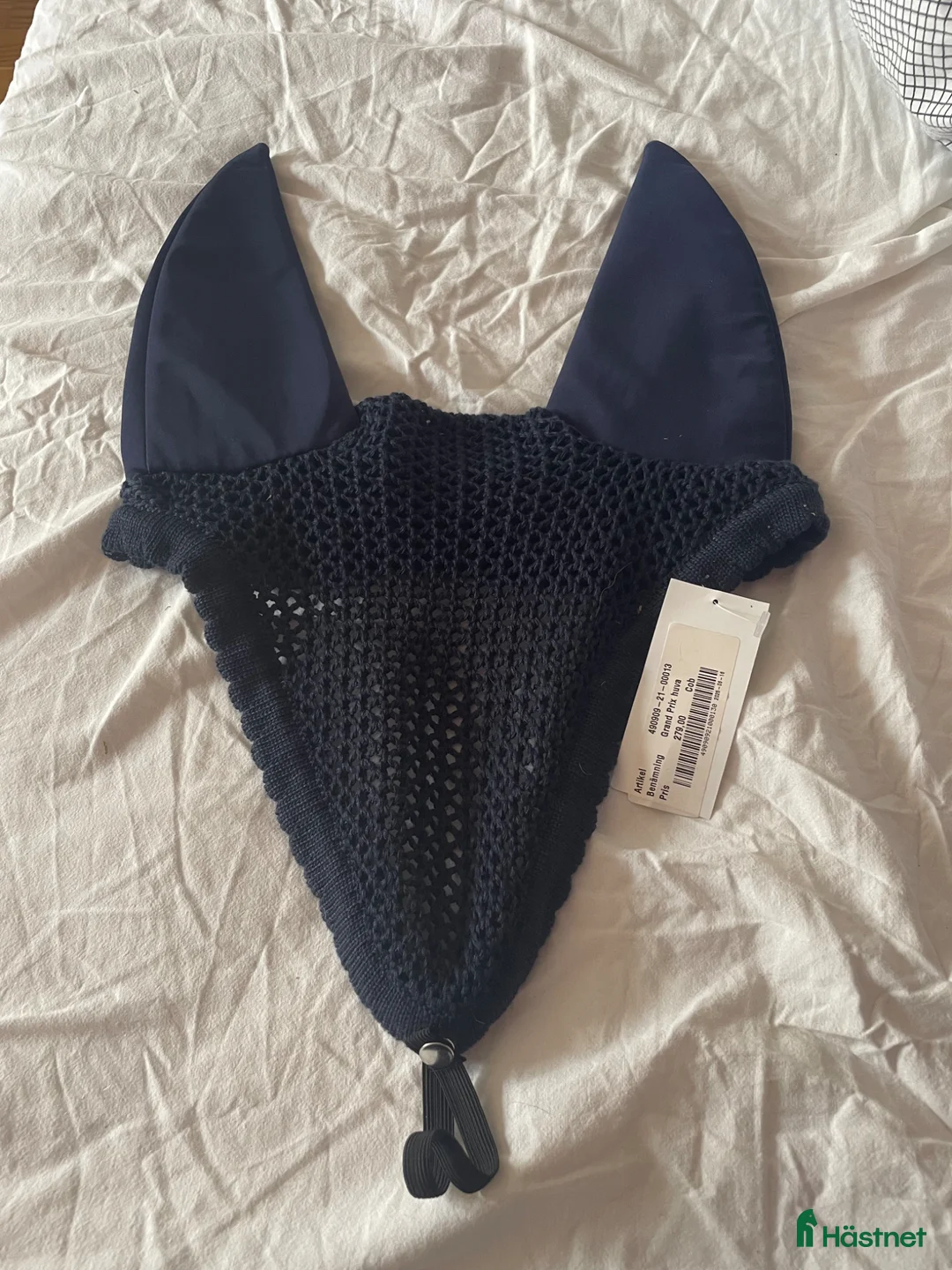 Träns hästutrustning till salu: Mörkblå huva med vadding  i Blentarp - Annons 1