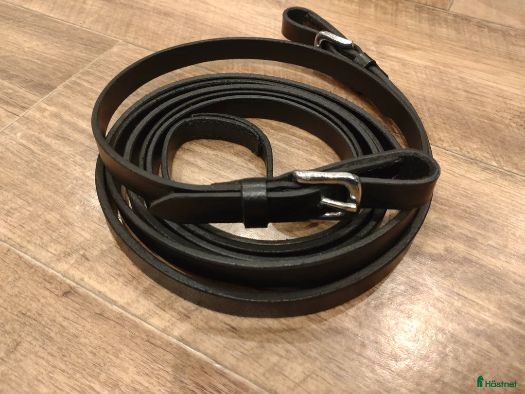 Träns hästutrustning till salu: MH tygel svart/silver 310 lång - Annons 1