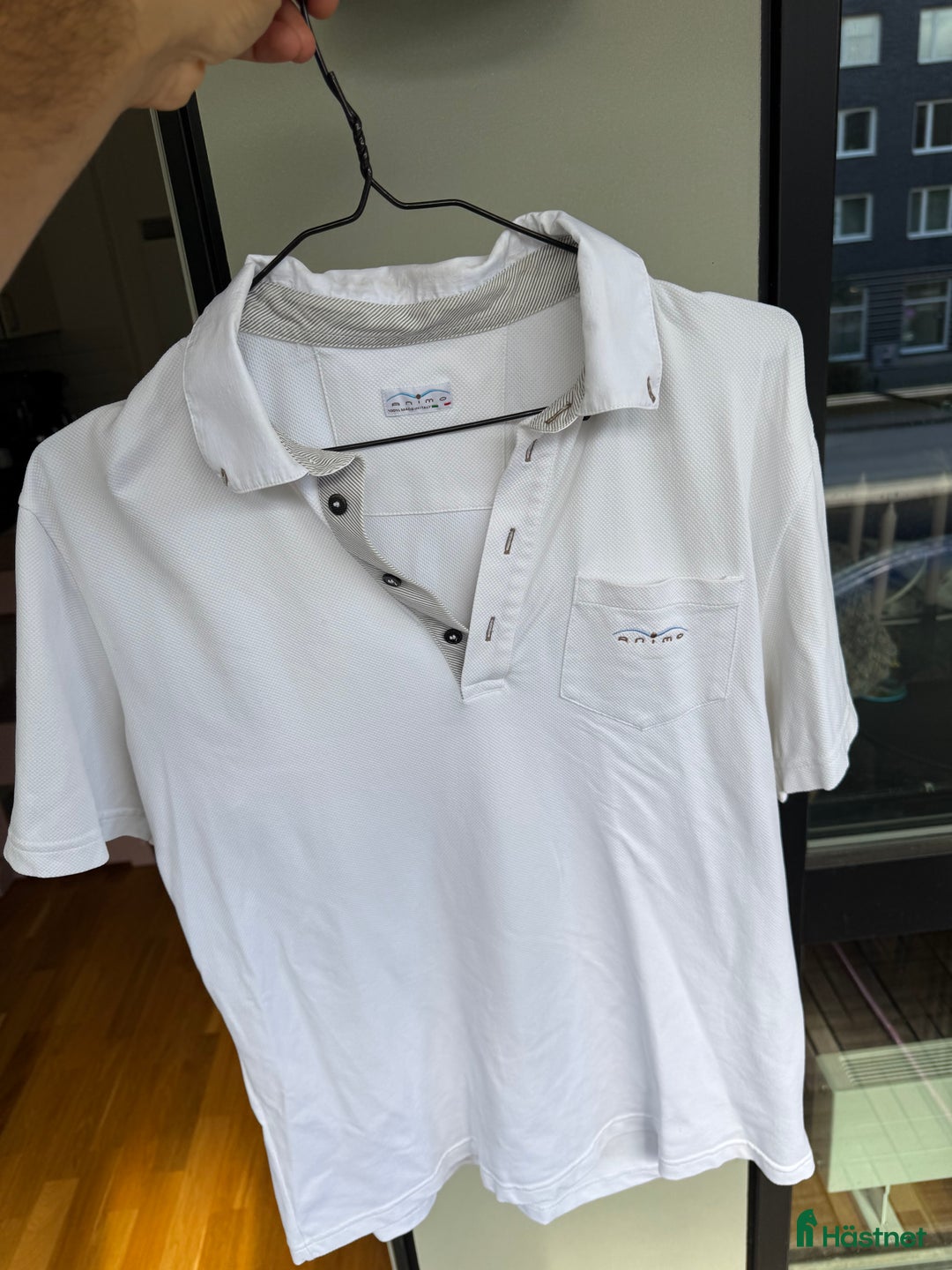 Övrigt Ridkläder ryttarutrustning till salu: Tävlings t shirt herr Animo vit L i Malmö - Annons 1